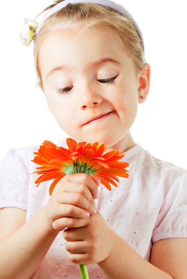 Funny little girl with flower