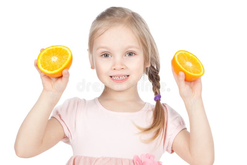 Funny little girl with oranges over white