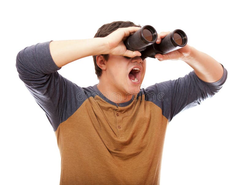 Portrait Of A Handsome Young Man Looking Through Binoculars Stock Image