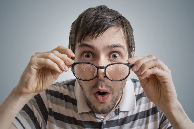 Funny Man Has Open Mouth and is Surprised and Shocked Stock Photo