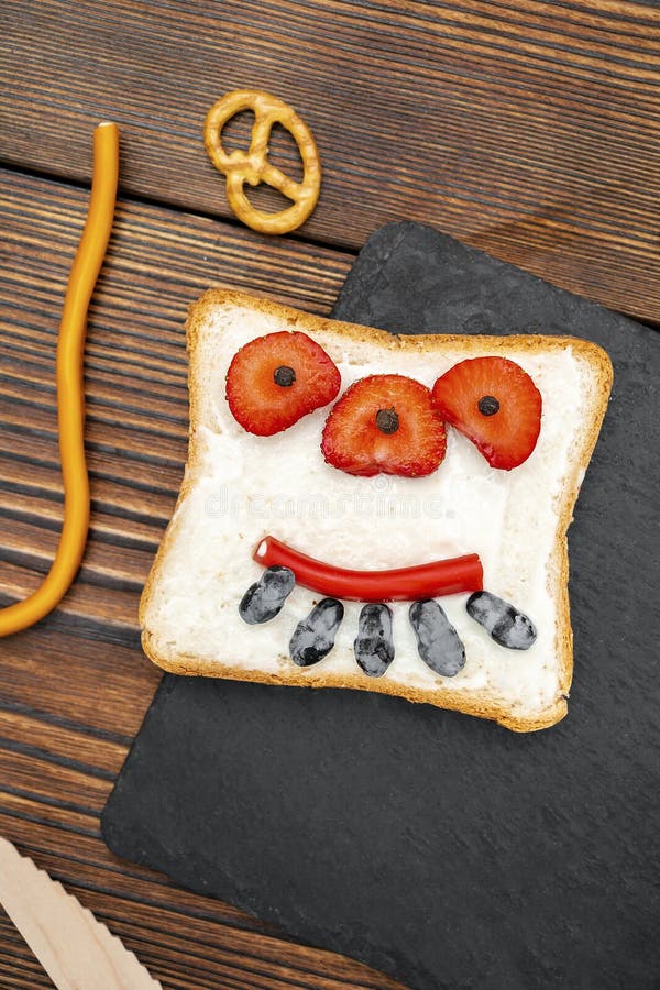 Funny Monster Face on Halloween Sandwich Toast Bread with Butter ...