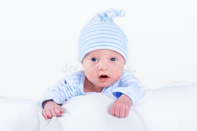 Funny Newborn Baby Boy Playing on His Tummy Stock Photo - Image of blue ...