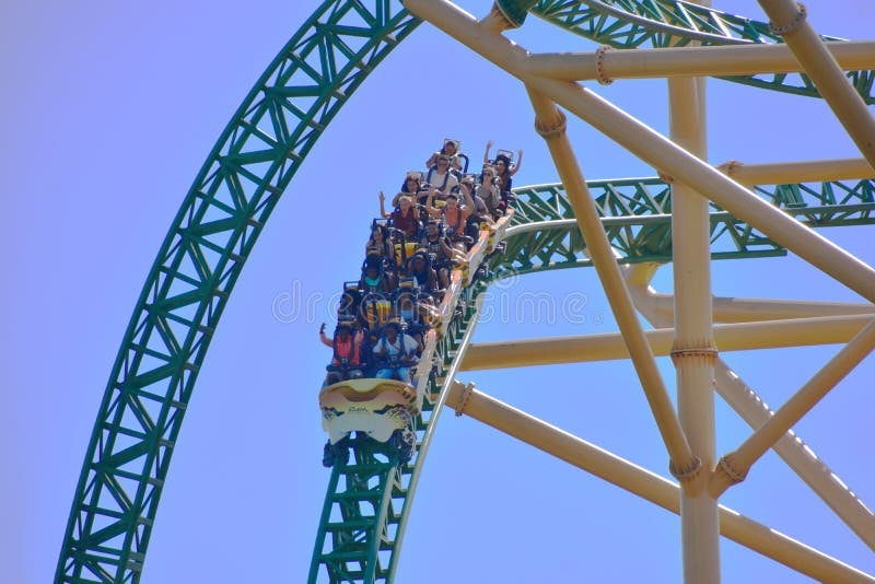 Funny people, descending to 60 miles per hour in amazing Rollercoaster at Tampa Bay area. stock image Funny people, descending to 60 miles per hour in amazing Rollercoaster at Tampa Bay area. stock image