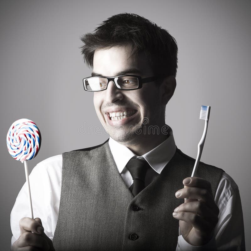 Funny portrait of smart happy young man