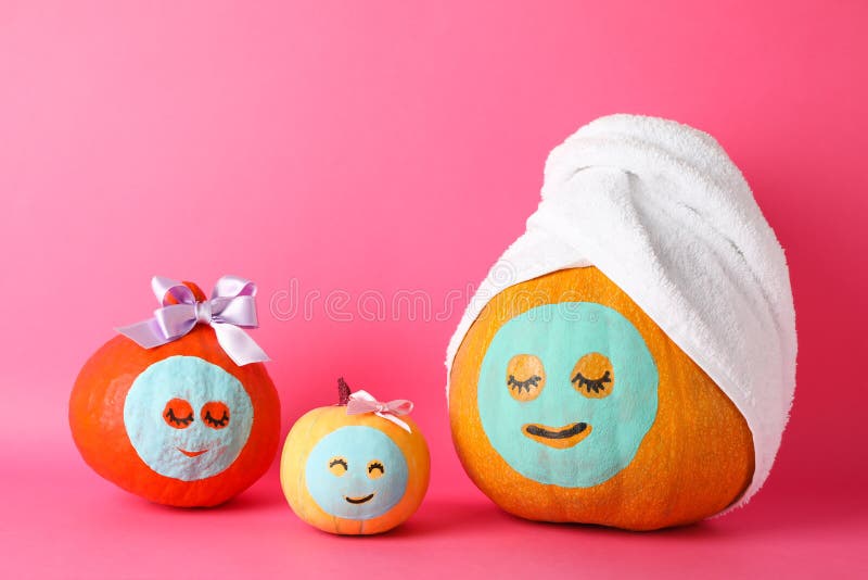 Funny pumpkins on pink background stock images Funny pumpkins on pink background stock images