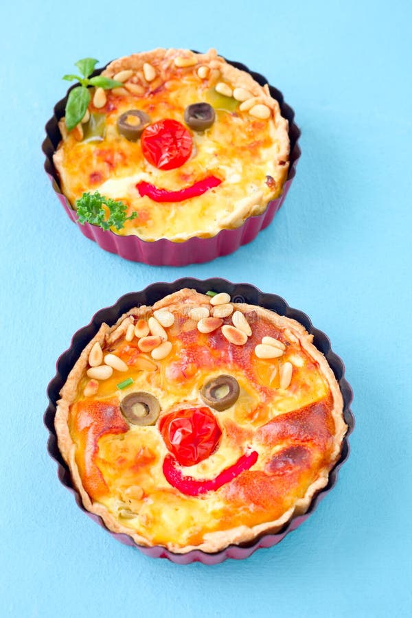 Funny quiches stock photo. Image of pepper, dish, tomato 165572766