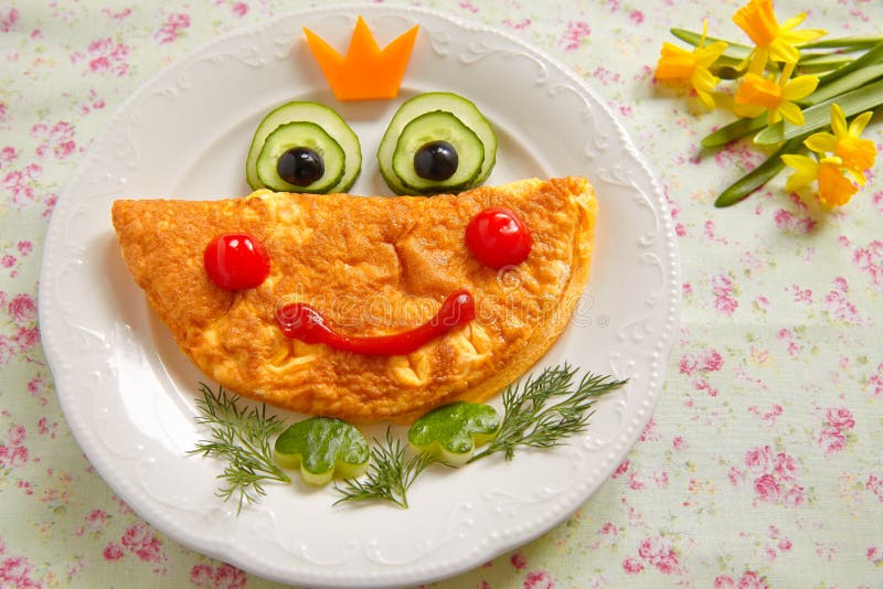 Funny smiling frog princess omelette