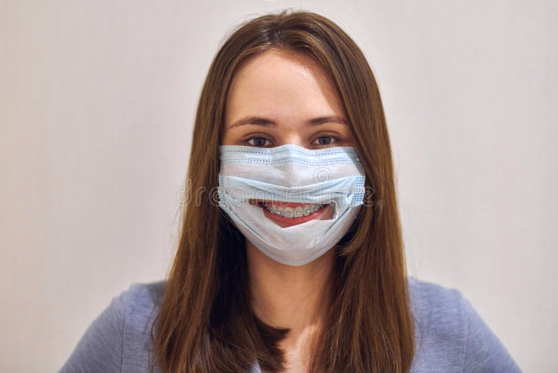 Funny Smiling Girl with Dental Braces Wearing Surgical Mask Stock Image ...