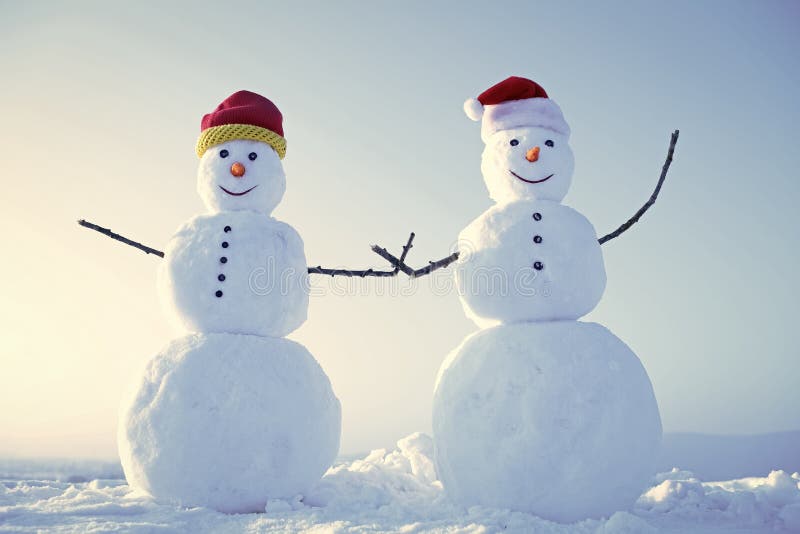 Funny snowmen. Snowman couple outdoor. stock photography Funny snowmen. Snowman couple outdoor. stock photography