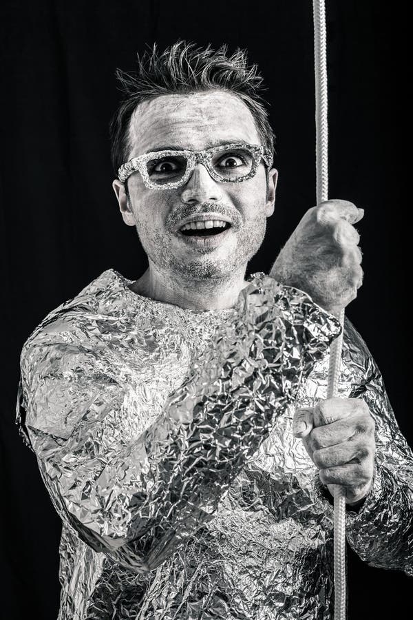 Funny spaceman with rope stock image