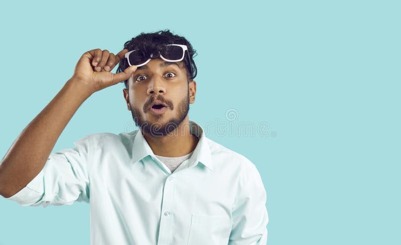 Funny Surprised Indian Guy Looking at You with Shocked Expression on Light  Blue Background. Stock Photo - Image of amazement, face: 251840646