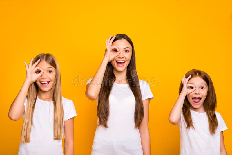 Funny Three Sister Ladies Holding Hands in Okey Symbols Near Eye Like Specs  Wear Casual Outfit Isolated Yellow Stock Photo - Image of friends,  childhood: 157727254