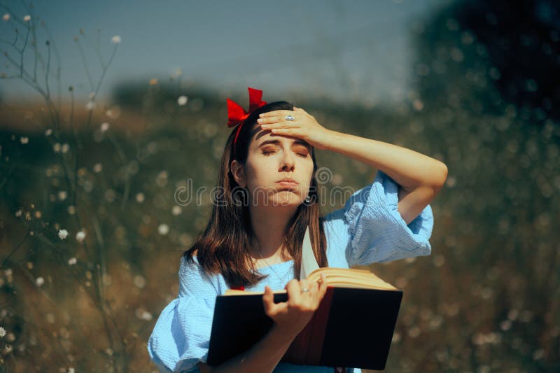 Funny Woman Reading a Book feeling Puzzled and Surprised stock photo