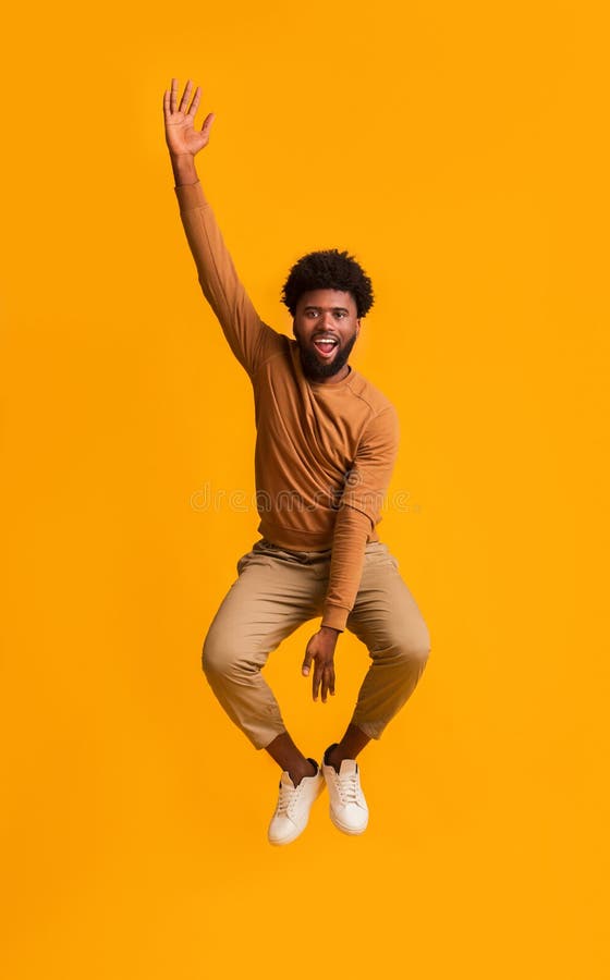 Funny Young Afro Man Jumping in the Air Stock Photo - Image of flying, friendly: 166304652 Funny Young Afro Man Jumping in the Air Stock Photo - Image of flying, friendly: 166304652
