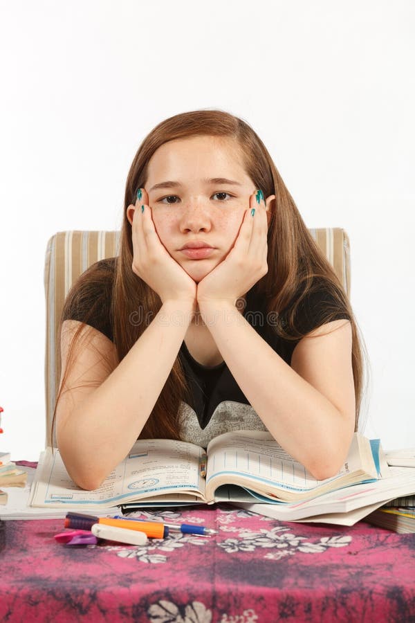 Aborrecida de fazer trabalhos de casa fotografia de stock