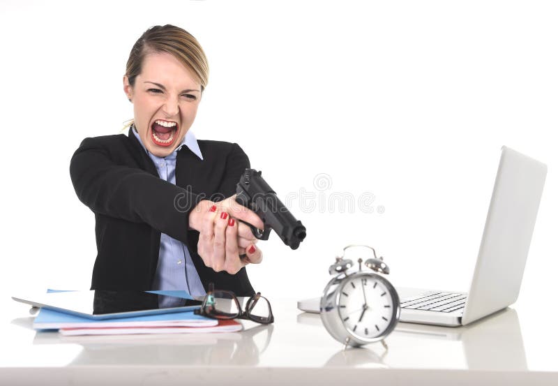 Furious angry businesswoman working pointing gun to alarm clock in out of time concept