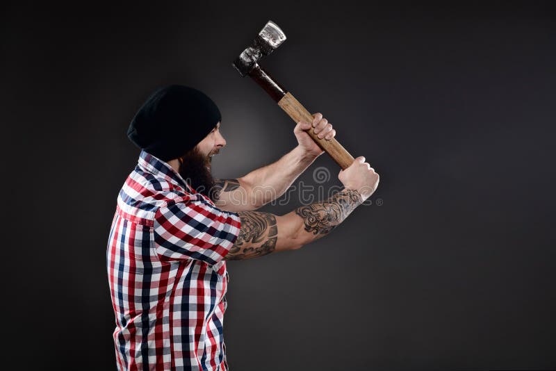 The Lumberjack Is Cutting Wood Or Firewood With Axe Outdoors. Stock Photo,  Picture and Royalty Free Image. Image 97231743.