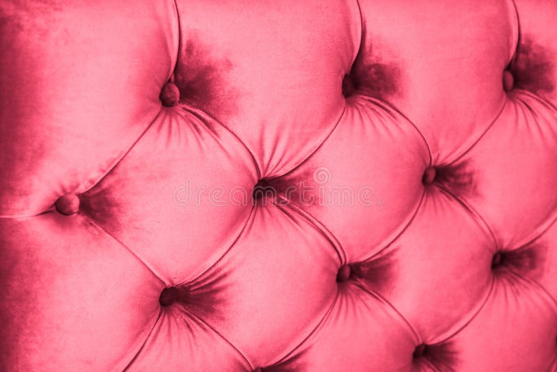 Pink luxury velour quilted sofa upholstery with buttons, elegant home decor texture and background stock image Pink luxury velour quilted sofa upholstery with buttons, elegant home decor texture and background stock image