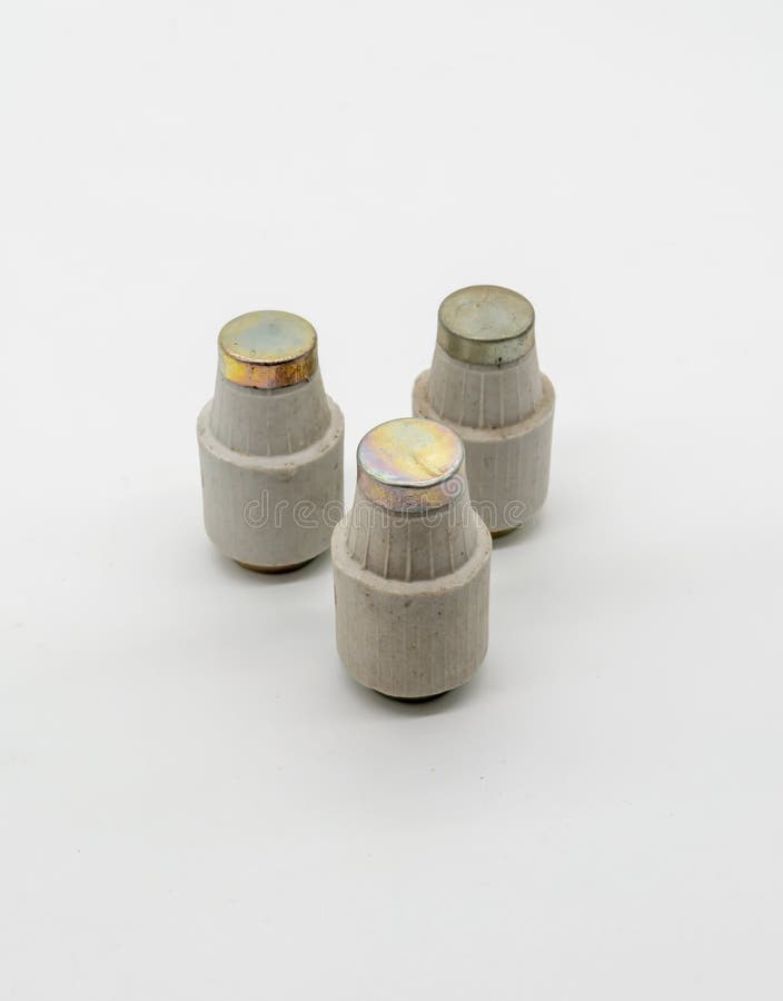 Fuse cup, ceramic fuse, vintage fuse isolated on white royalty free stock images