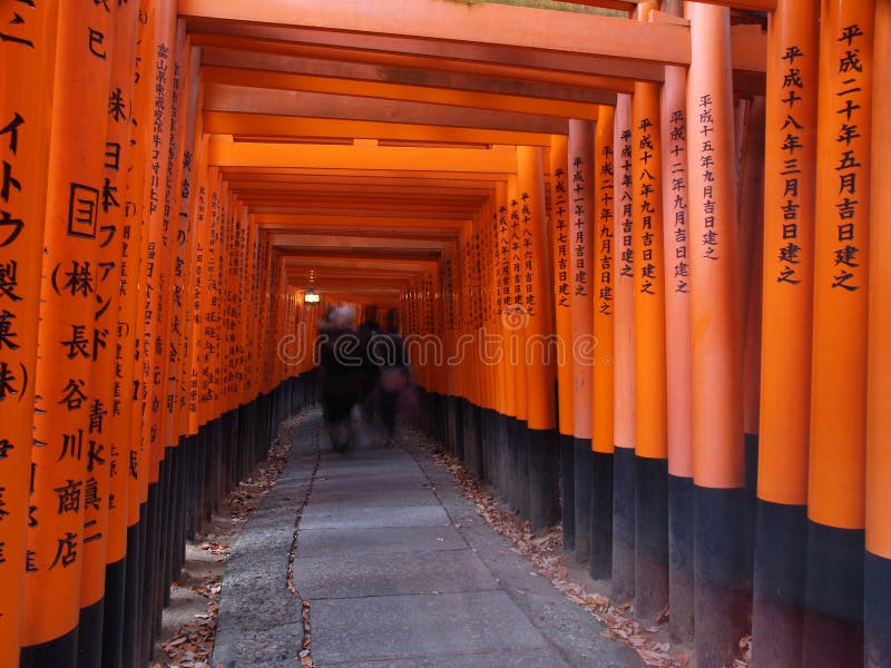 Fushimi Inari Shrine - near Kyoto, Japan. New year day celebration. Red pylons stock images, royalty-free photos and pictures