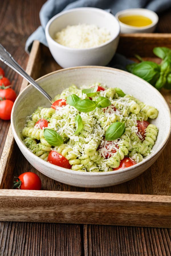 Fusilli Pasta with Basil Pesto Sauce and Cherry Tomatoes, Sprinkled