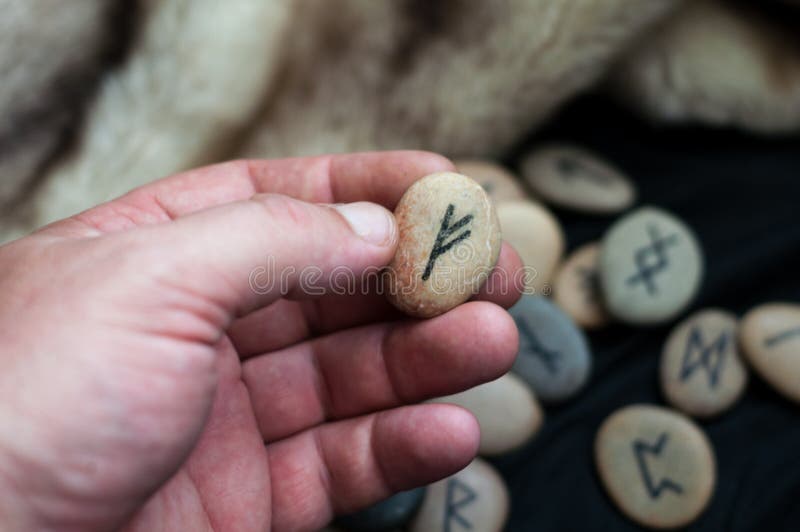Stone runes on the hand