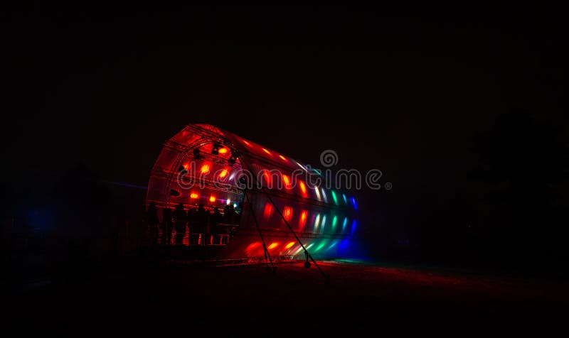 Futuristic abstract glowing colorful photon tunnel made from DMX lights stock images