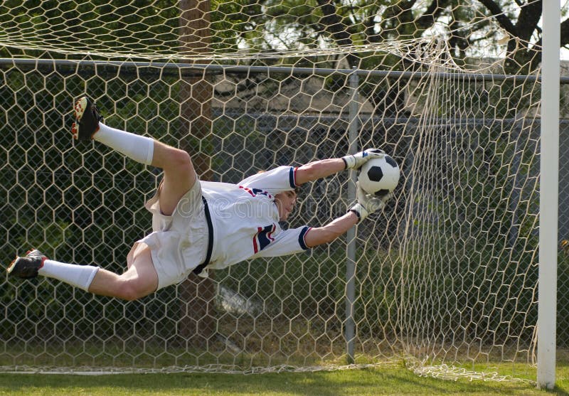 Fußball-Fußball-Ziel-Wächter, der außer bildet stockbild Fußball-Fußball-Ziel-Wächter, der außer bildet stockbild