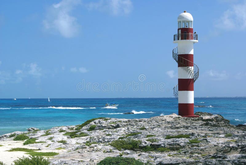 Fyr på en strand i Cancun, Mexico royaltyfri fotografi Fyr på en strand i Cancun, Mexico royaltyfri fotografi