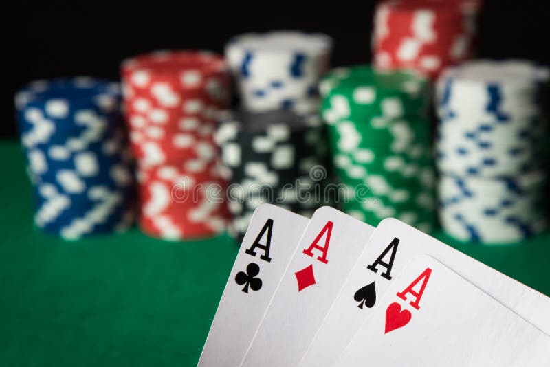 Fyra av överdängare för en sortpokerhand fotografering för bildbyråer Fyra av överdängare för en sortpokerhand fotografering för bildbyråer