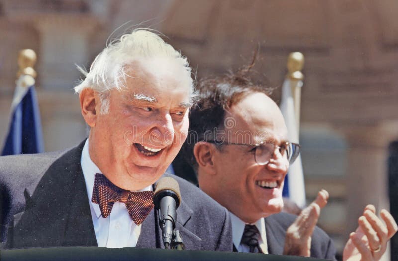 Fyvush Finkel shares the stage with then New York City mayor, Rudy Giuliani, and regales a crowd at May 12, 1997 in Manhattan's Bryant Park during Jewish Heritage Week festivities. Finkel was an American stage, film, and Emmy Award-winning television actor. Brooklyn-born, he starred on the Yiddish theater stage where he performed for 35 years. He was also a stand-up comic in the Catskills on the so-called Borscht Belt circuit. He is perhaps best known for his tv role of eccentric defense lawyer Douglas Wambaugh a role for which he won his Emmy in 1994 in the critically acclaimed drama â€œPicket Fences.â€ He also gained popularity for his role as the curmudgeonly history teacher Harvey Lipschultz in the drama â€œBoston Public.â€ He appeared in the original Broadway production of â€œFiddler on the Roofâ€ in 1964. Brooklyn-born, Finkel died at 93 on August 14, 2016. Fyvush Finkel shares the stage with then New York City mayor, Rudy Giuliani, and regales a crowd at May 12, 1997 in Manhattan's Bryant Park during Jewish Heritage Week festivities. Finkel was an American stage, film, and Emmy Award-winning television actor. Brooklyn-born, he starred on the Yiddish theater stage where he performed for 35 years. He was also a stand-up comic in the Catskills on the so-called Borscht Belt circuit. He is perhaps best known for his tv role of eccentric defense lawyer Douglas Wambaugh a role for which he won his Emmy in 1994 in the critically acclaimed drama â€œPicket Fences.â€ He also gained popularity for his role as the curmudgeonly history teacher Harvey Lipschultz in the drama â€œBoston Public.â€ He appeared in the original Broadway production of â€œFiddler on the Roofâ€ in 1964. Brooklyn-born, Finkel died at 93 on August 14, 2016.