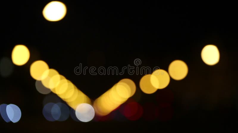 Färgglad bokeh på svart bakgrund arkivfilmer