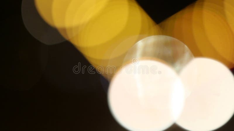 Färgglatt bokeh på svart bakgrund arkivfilmer