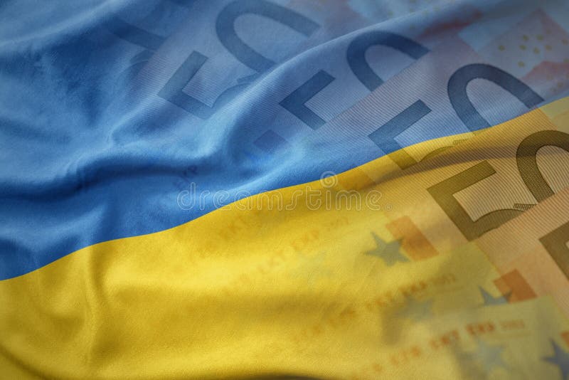 färgrik vinkande nationsflagga av Ukraina på en bakgrund för europengarsedlar royaltyfria foton färgrik vinkande nationsflagga av Ukraina på en bakgrund för europengarsedlar royaltyfria foton