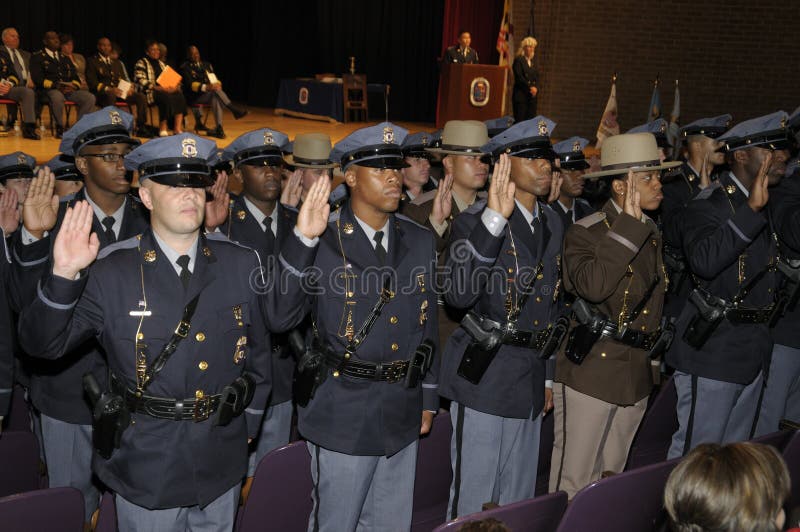 Police officers get sworn in at the police graduation in Greenbelt, Maryland. Police officers get sworn in at the police graduation in Greenbelt, Maryland
