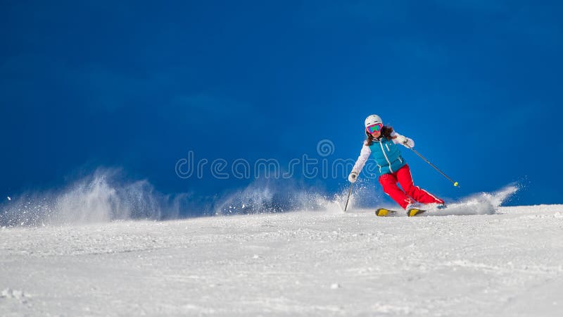 Fêmea da menina da mulher no esqui fotografia de stock royalty free Fêmea da menina da mulher no esqui fotografia de stock royalty free