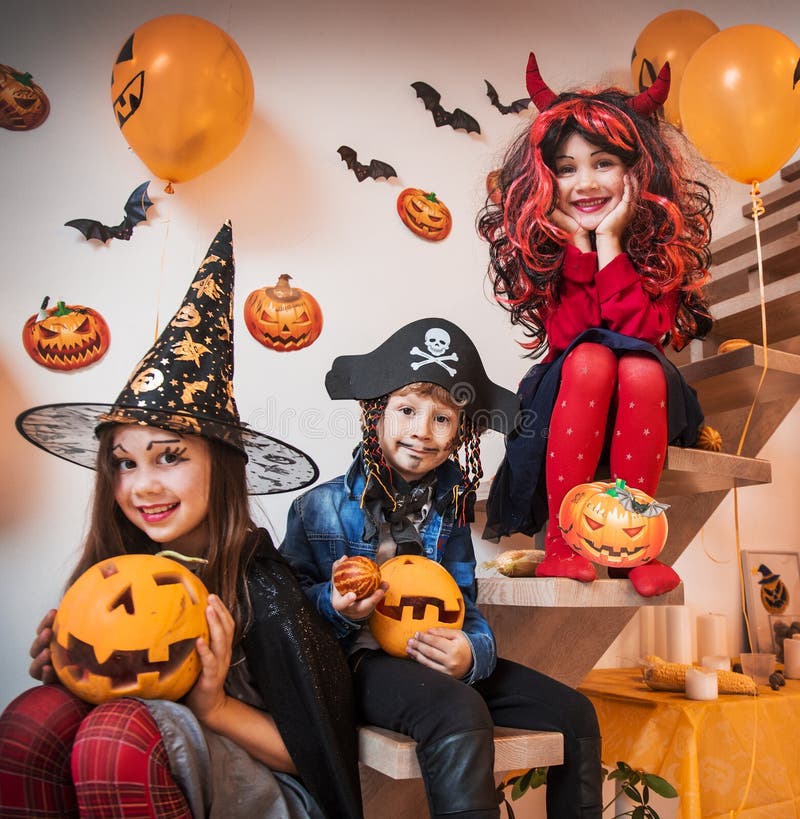 Group of funny  children in costume celebrate together a halloween party. Group of funny  children in costume celebrate together a halloween party