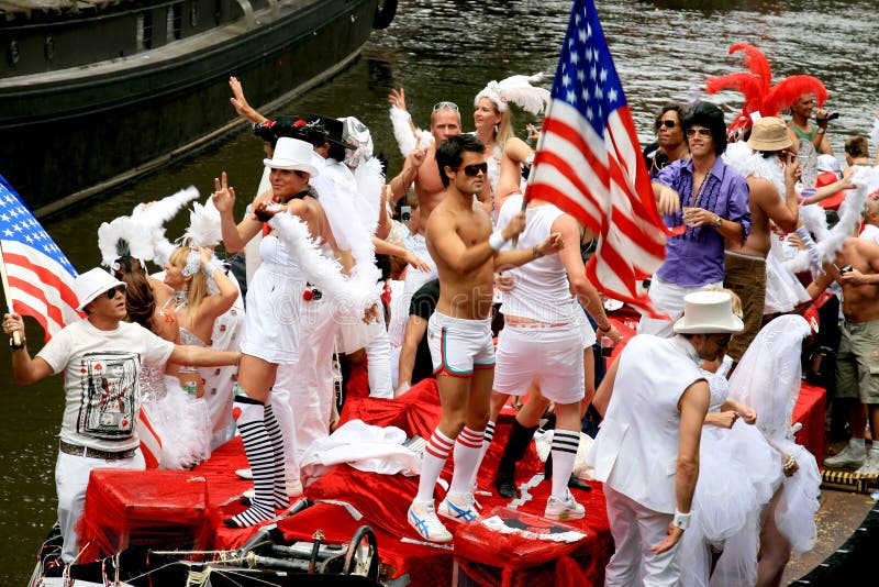 The highlight of the Amsterdam Pride Weekend is the famous Canal Parade on Saturday afternoon (2.8.2008). Over 70 boats are floating through the Prinsengracht and Amstel River. One of the boats represents the Americans. The highlight of the Amsterdam Pride Weekend is the famous Canal Parade on Saturday afternoon (2.8.2008). Over 70 boats are floating through the Prinsengracht and Amstel River. One of the boats represents the Americans.