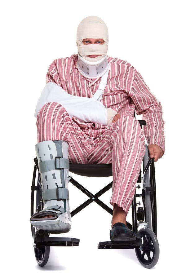 Photo of a man with various injuries wearing striped pyjames and sitting in a wheelchair, front view. Photo of a man with various injuries wearing striped pyjames and sitting in a wheelchair, front view.