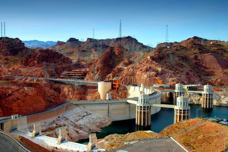 Rising more than 700 feet above the raging waters of the Colorado River, it was called one of the greatest engineering works in history. Hoover Dam, built during the Great Depression, drew men desperate for work to a remote and rugged canyon near Las Vegas. There they struggled against brutal heat, choking dust and perilous heights to build a colossus of concrete that brought electricity and water to millions, transforming the American Southwest. Rising more than 700 feet above the raging waters of the Colorado River, it was called one of the greatest engineering works in history. Hoover Dam, built during the Great Depression, drew men desperate for work to a remote and rugged canyon near Las Vegas. There they struggled against brutal heat, choking dust and perilous heights to build a colossus of concrete that brought electricity and water to millions, transforming the American Southwest.