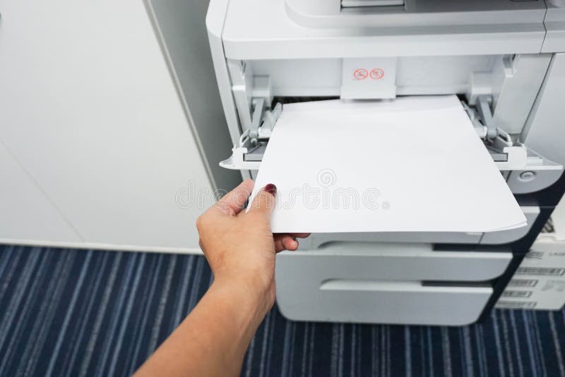 Insert paper into the printer for printing business documents. Insert paper into the printer for printing business documents