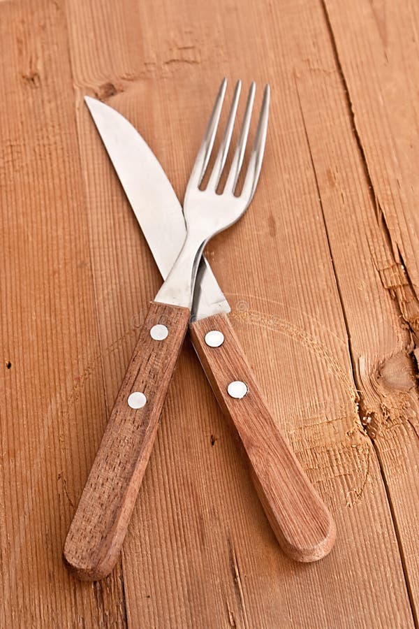 Gabel und Messer stockfoto. Bild von rustikal, holz, hölzern 13513876