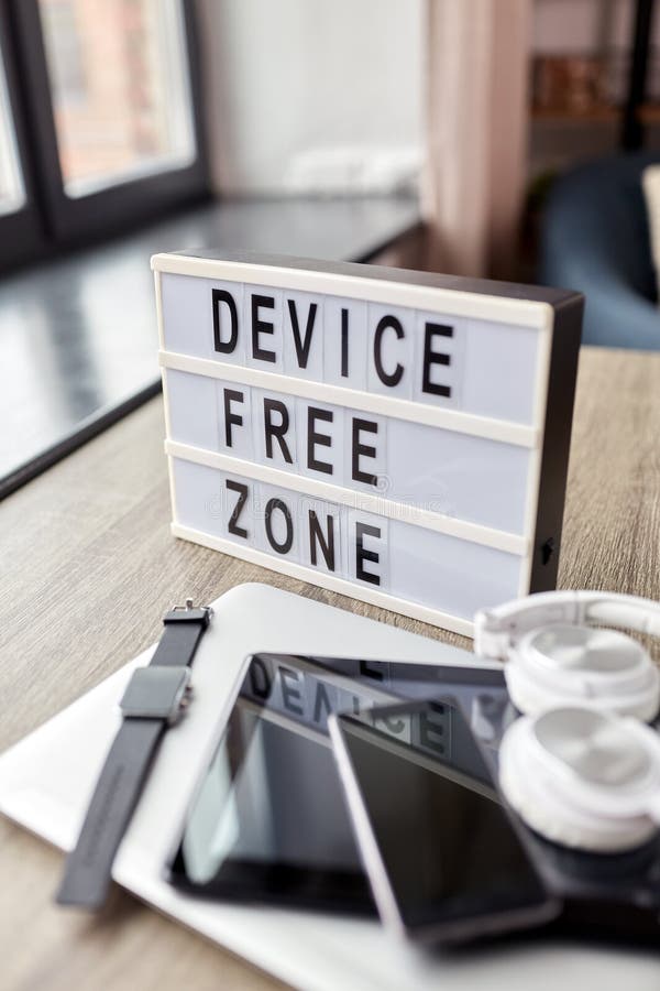 Gadgets and Device Free Zone Words on Light Box Stock Photo Image of