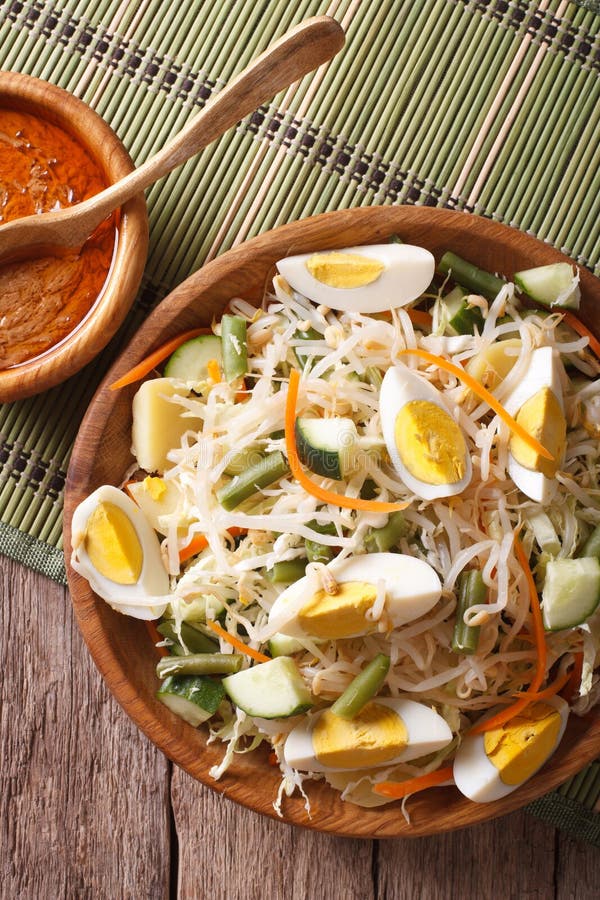 Gado Gado Salad with Peanut Sauce Closeup. Horizontal Top View Stock