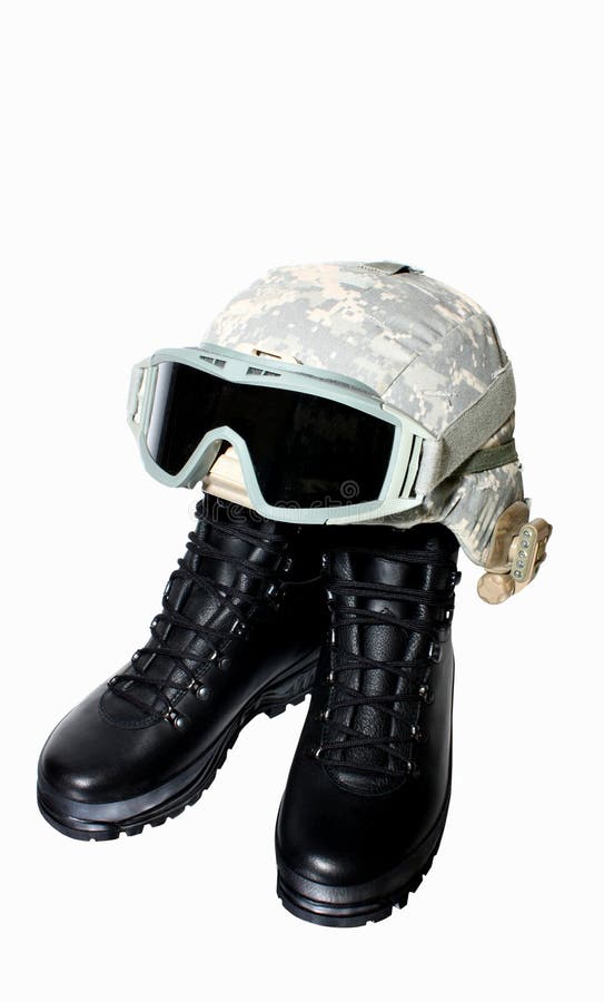 Gaines et casque militaires photo stock Gaines et casque militaires photo stock