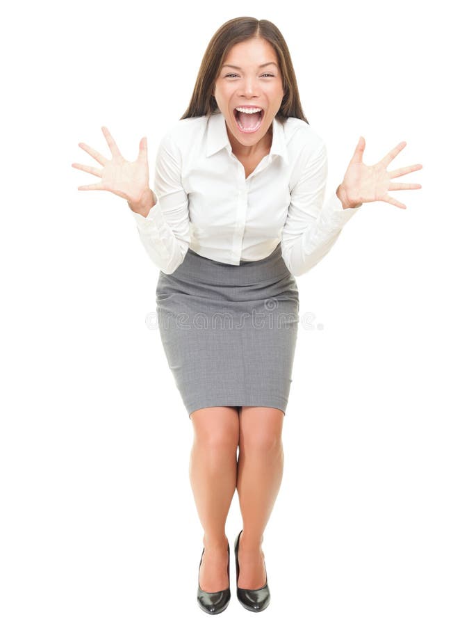 Crazy excited businesswoman screaming. Full length portrait of mixed race Asian / Caucasian female model isolated on white background. Crazy excited businesswoman screaming. Full length portrait of mixed race Asian / Caucasian female model isolated on white background.