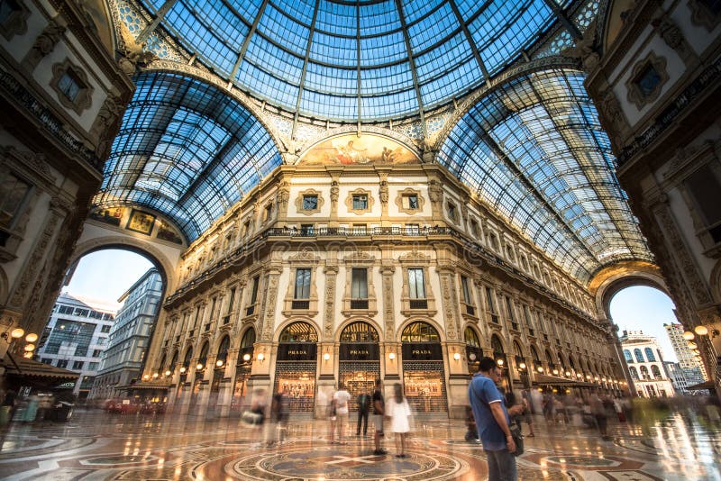 MILAN, ITALY - July 2, 2017: Galleria Vittorio Emanuele II in Milano. It`s one of the world`s oldest shopping malls, designed and built by Giuseppe Mengoni between 1865 and 1877. MILAN, ITALY - July 2, 2017: Galleria Vittorio Emanuele II in Milano. It`s one of the world`s oldest shopping malls, designed and built by Giuseppe Mengoni between 1865 and 1877.
