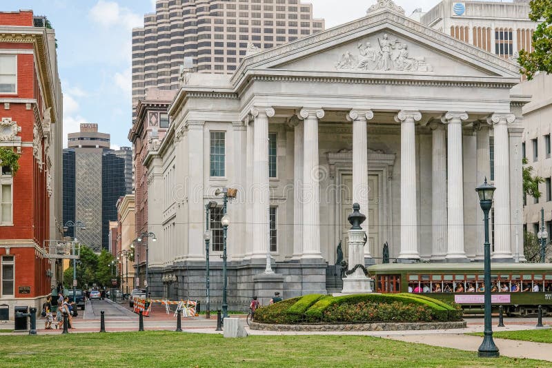 Gallier Hall historic building with Lafayette Square in the foreground and surrounding buildings in the central business district of New Orleans, Louisiana, USA. Gallier Hall historic building with Lafayette Square in the foreground and surrounding buildings in the central business district of New Orleans, Louisiana, USA