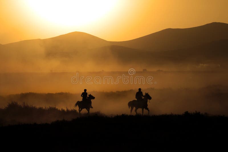 Dust cloud and running horsesn. Dust cloud and running horsesn