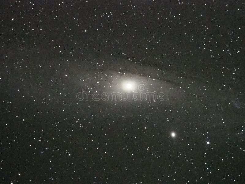 Galáxia do Andromeda e de estrelas do universo céu noturno foto de stock Galáxia do Andromeda e de estrelas do universo céu noturno foto de stock
